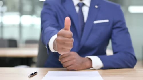 Hand of African Businessman Showing Thumbs Up