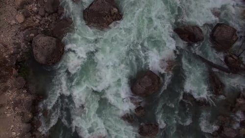 View From Above on the Flow of Water, the River Passes Next To the Sandy Shore