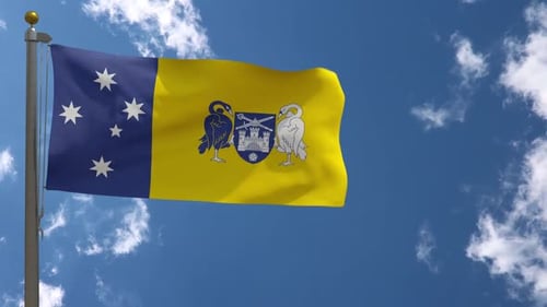 Australian Capital Territory Flag Waving in Blue Sky