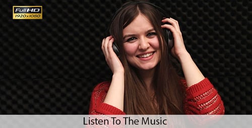 Woman Enjoys Music with Headphones On