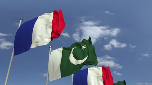 Waving Flags of Pakistan and France with Blue Sky Background