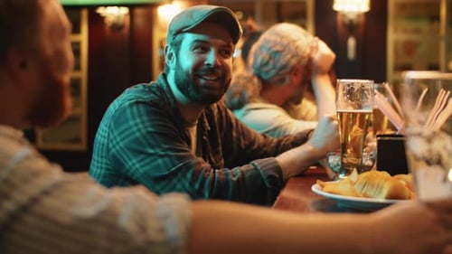 Friends Talking and Drinking at a Bar