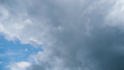 Dramatic Rolling Clouds Against a Blue Sky