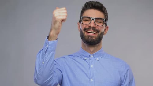 Adult Man Smiling and Giving Thumbs Up