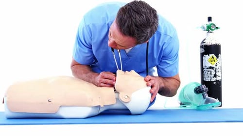 Medical Professional Training With Medical Dummy