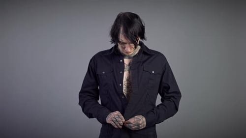 Man Buttons Black Shirt with Tattoos
