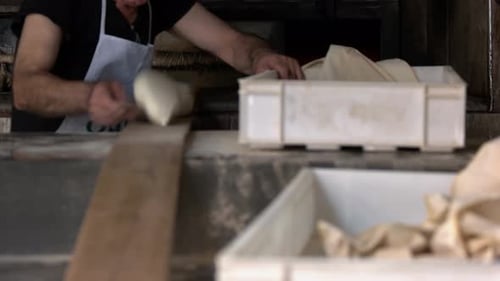 Baker Working in Bakery