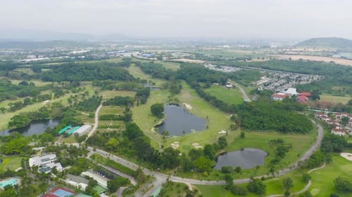 Aerial view of Golf Course Club and hotel resort. Green natural garden park in sport and recreation
