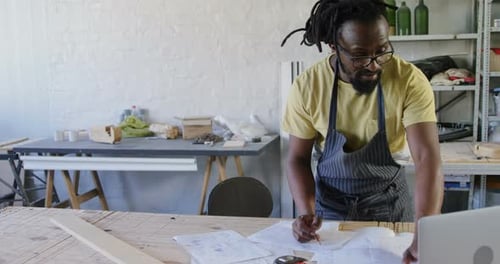 Carpenter Designs Project in Workshop Setting