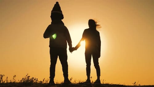 Family Silhouette at Sunrise