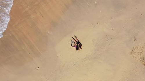 Romance on the paradise beach. Waves washing the soft sand of the Fiji island. Honeymoon vacation co
