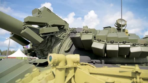 Close Up of Olive Green Military Tank on Display