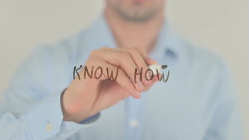 Man Writes 'Know How' on Clear Screen