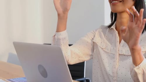 Young Woman Using VR Headset in Office