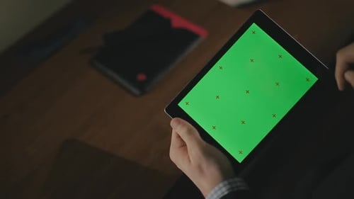 Male Hand Gesturing on Green Screen Tablet Pc. Businessman Using Tablet Computer