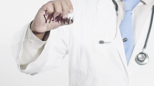 Doctor Writes Vagina on Clear Screen