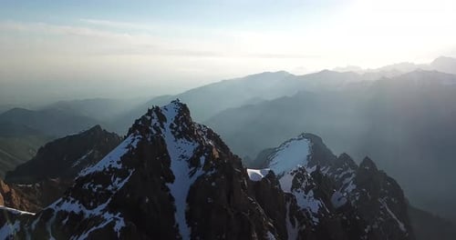 Rocky Mountain Peaks Covered with Snow. Shooting from A Drone, Top View