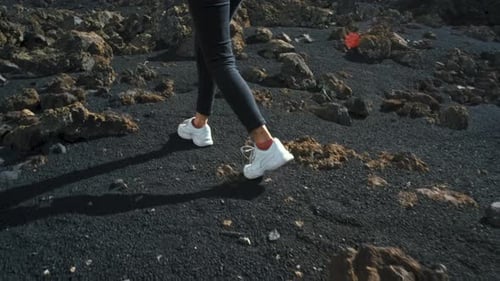 Closeup Shot of Woman Traveler Walks Through the Lava Field Around Chinyero Volcano in the Teide