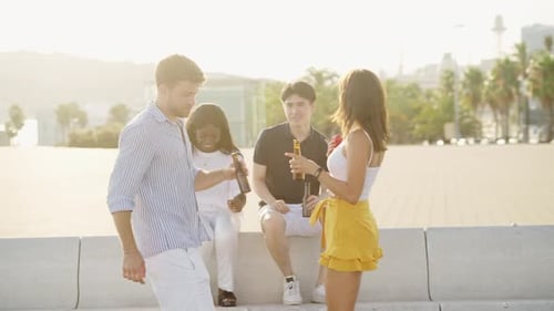 Friends Enjoying Beers Together in the City