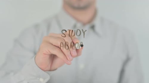 Close Up of Hand Writing Study Abroad