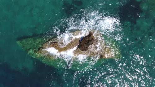 Small Islet Island Formed by the Accumulation of Rock Deposits Atop a Reef in the Sea