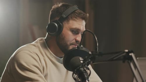 Young Adult Recording a Podcast in Studio