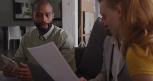 Young creative professionals working in a modern office