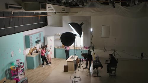 Studio Set with Girls and Filming Crew