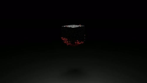 Close up of silver metallic cube rotating surrounded by endless quantity of tiny red spheres