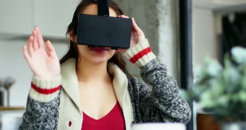 Woman Wearing VR Headset Interacting With Virtual World