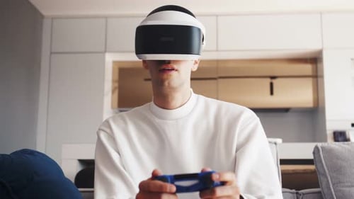 Man Plays Virtual Reality in Modern Living Room