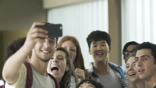Enthusiastic Students Taking Selfie in School Hallway