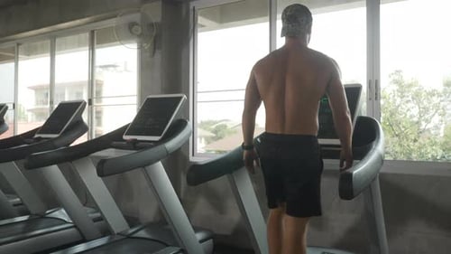 Doing Fitness Exercise. Athletic People Actively Workout in the Modern Gym. Sports People