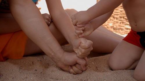 Family Making Hand Tower