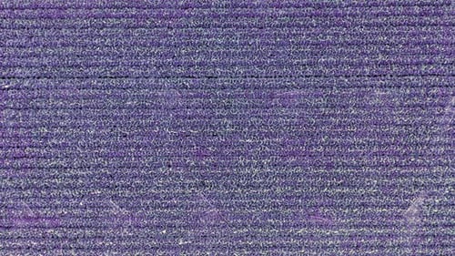 Close Up Shot of a Woven Purple Surface