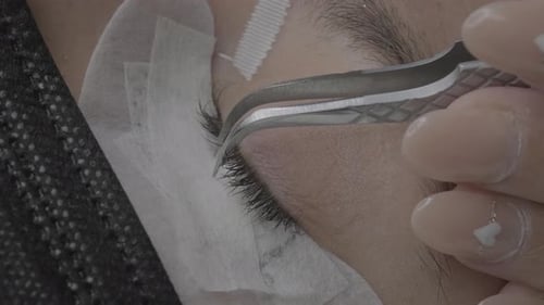 Close up of false eyelash placement on the eye