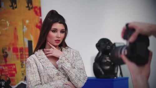 Elegant Woman Posing for Fashion Photos Indoors