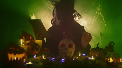 Woman Witch Performing a Spooky Halloween Spell
