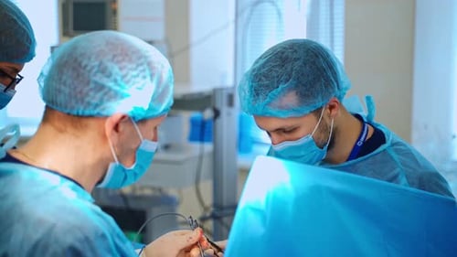 Medical Professionals Performing an Operation in Operating Room