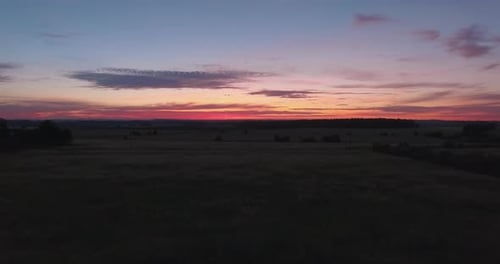 Picturesque Sunset Over Vast Rural Landscape
