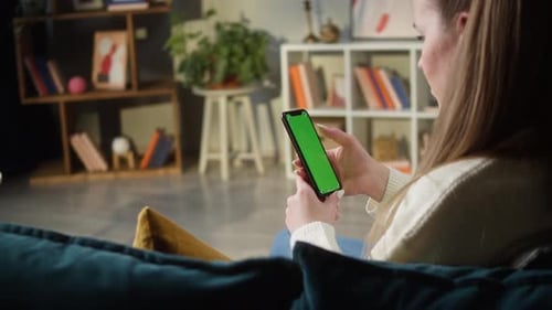 Woman Using Smartphone with Green Screen
