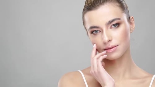 Woman Posing Gracefully in Studio