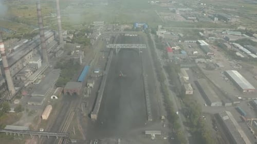Smoke From The Chimneys Of The Thermal Power Plant. Harvested Coal. Environmental Pollution.