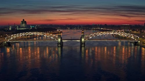 White Nlight At Night Over The Neva River And The Bridge