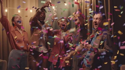 Group of Friends Celebrating with Confetti and Champagne