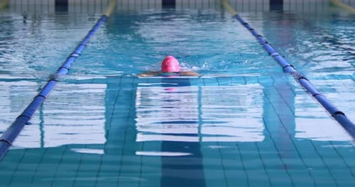Swimmer training in a swimming pool