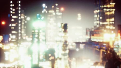 Defocused Bokeh of Cityscape at Twilight Time