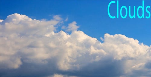 Clouds Moving Slowly Across a Clear Blue Sky