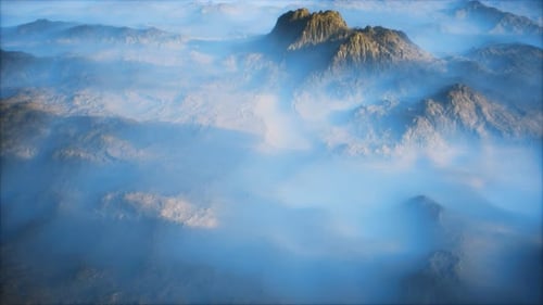 Distant Mountain Range and Thin Layer of Fog on the Valleys