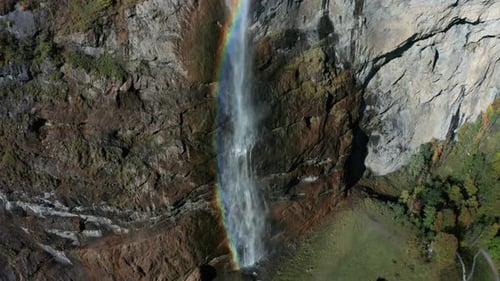 Aerial View of a Waterfall and Rainbow in the Village of Lauterbrunnen. Switzerland in the Fall
